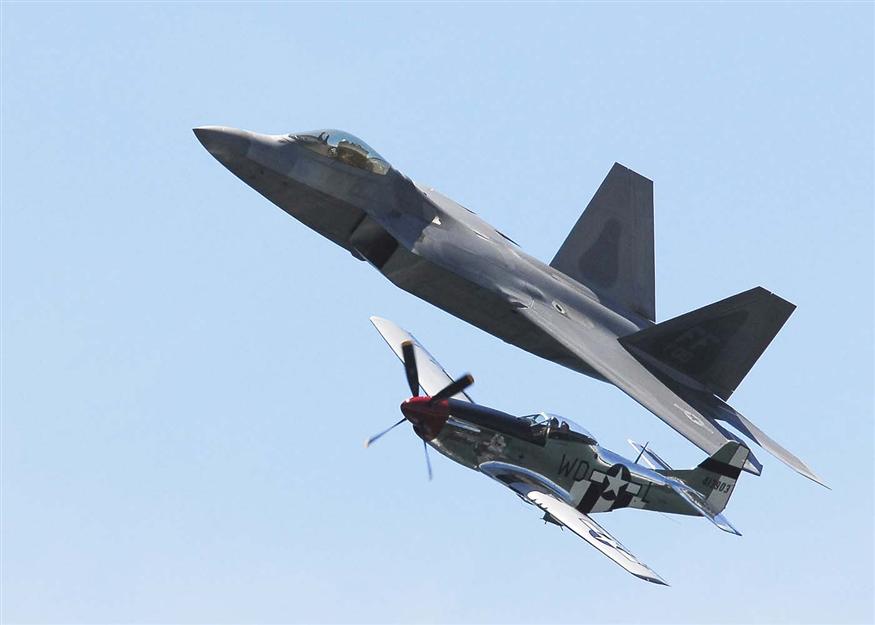An F-22 Raptor and P-51 Mustang